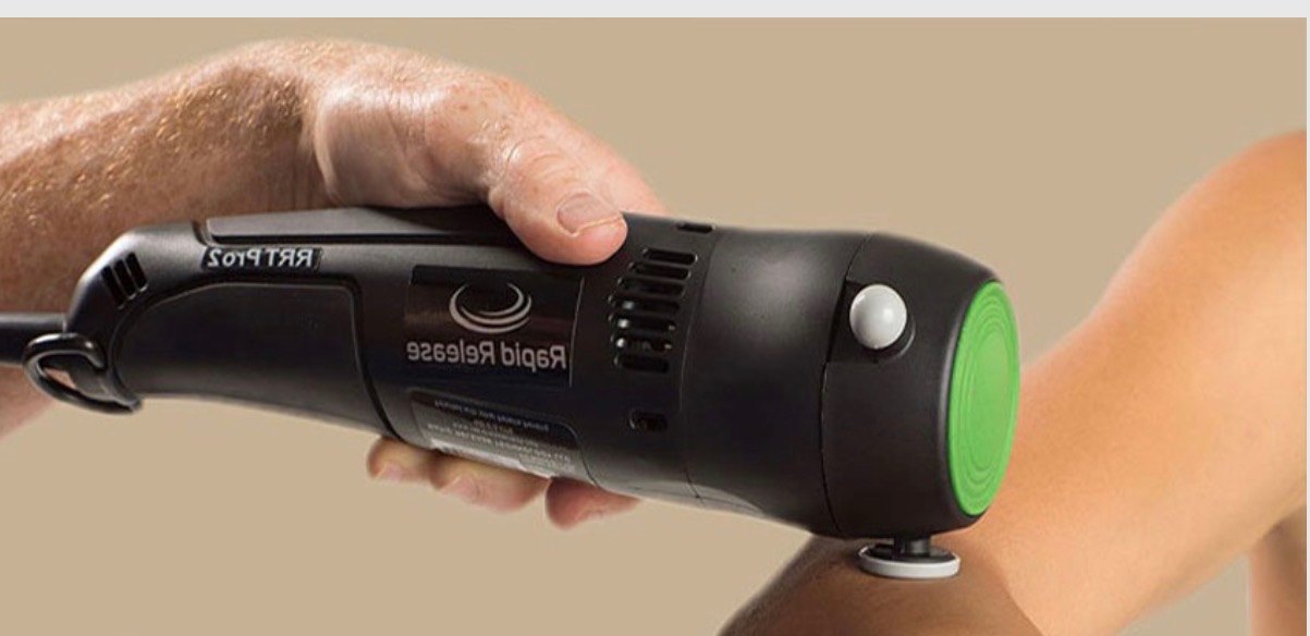 Rapid Release Therapy targeted vibration device applied to the leg